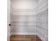 Walk-in pantry with white wire shelving and wood-look flooring at 1770 Post Ct # Lot 510, Gastonia, NC 28054