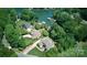 Aerial view of the lake houses surrounded by lush greenery and private docks at 122 Long Cove Ln, Mooresville, NC 28117