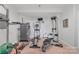 Basement fitness area with carpet, equipment, and white walls at 122 Long Cove Ln, Mooresville, NC 28117