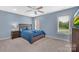 Cozy bedroom featuring a well-lit window, and stylish and comfortable bed at 122 Long Cove Ln, Mooresville, NC 28117