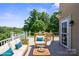 Relaxing deck area with stylish outdoor furniture, perfect for entertaining at 122 Long Cove Ln, Mooresville, NC 28117