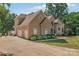 Two-story home with a three-car garage and manicured landscaping at 122 Long Cove Ln, Mooresville, NC 28117