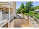 Exterior view showing staircase and basement access at 122 Long Cove Ln, Mooresville, NC 28117