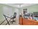 Basement office with a large desk and ample storage at 122 Long Cove Ln, Mooresville, NC 28117