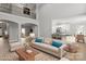 Spacious living room with high ceilings, balcony, hardwood floors, and neutral decor at 122 Long Cove Ln, Mooresville, NC 28117