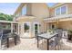 Large patio with outdoor seating, perfect for enjoying outdoor dining and relaxation at 122 Long Cove Ln, Mooresville, NC 28117