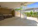 Spacious patio featuring a hot tub and a spiral staircase leading to upper levels at 122 Long Cove Ln, Mooresville, NC 28117