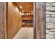 Walk-in wine cellar with wooden shelving and tile floor at 122 Long Cove Ln, Mooresville, NC 28117