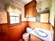 Bathroom with wood cabinets and a sink at 1506 Dallas Cherryville Hwy, Dallas, NC 28034