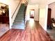 Spacious entryway with staircase and hardwood floors at 1506 Dallas Cherryville Hwy, Dallas, NC 28034