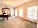 Bright living room featuring a grand piano and fireplace at 1506 Dallas Cherryville Hwy, Dallas, NC 28034