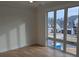 Bedroom with large windows overlooking the neighborhood at 13217 Terrace Court Dr, Charlotte, NC 28278