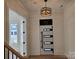 Bright entryway with a modern front door and light wood floors at 13217 Terrace Court Dr, Charlotte, NC 28278