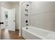 Modern bathroom featuring a white tiled shower with black fixtures and a built-in niche at 2027 Cedar Falls Dr # 75, Waxhaw, NC 28173