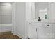 Bathroom featuring a shower/tub combo and a white vanity at 2027 Cedar Falls Dr # 75, Waxhaw, NC 28173