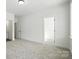 Spacious bedroom with neutral carpet and an ensuite bathroom and walk-in closet at 2027 Cedar Falls Dr # 75, Waxhaw, NC 28173
