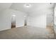 Spacious bedroom with neutral carpet and multiple doorways at 2027 Cedar Falls Dr # 75, Waxhaw, NC 28173