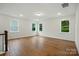 Bonus room with multiple windows, hardwood floors, and recessed lighting at 2027 Cedar Falls Dr # 75, Waxhaw, NC 28173