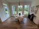 Charming dining area with natural light, a modern table set, and views of the backyard at 2027 Cedar Falls Dr # 75, Waxhaw, NC 28173