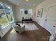 Bright home office with ample natural light, modern desk, and stylish decor for a productive workspace at 2027 Cedar Falls Dr # 75, Waxhaw, NC 28173