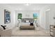 Bright and spacious main bedroom with plush neutral carpet and ample natural light at 2027 Cedar Falls Dr # 75, Waxhaw, NC 28173
