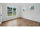 Well-lit office with wood floors, large windows and views of the neighborhood at 2027 Cedar Falls Dr # 75, Waxhaw, NC 28173
