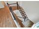 Staircase with wood treads and black iron railing at 2027 Cedar Falls Dr # 75, Waxhaw, NC 28173