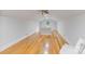 Spacious bonus room with wood floors, natural light, and neutral walls at 6620 Old Concord Rd, Salisbury, NC 28146