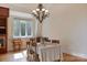 Dining room with natural light has wood floors and elegant chandelier at 6620 Old Concord Rd, Salisbury, NC 28146