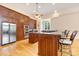 Spacious kitchen with stainless steel fridge, center island and bar stool seating at 6620 Old Concord Rd, Salisbury, NC 28146