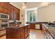 Spacious kitchen with wood cabinets, stainless appliances, an island and a window view at 6620 Old Concord Rd, Salisbury, NC 28146