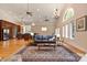 Expansive living room offers wood floors, high ceilings, large windows, and modern lighting at 6620 Old Concord Rd, Salisbury, NC 28146