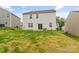 Large backyard featuring a gentle slope, with a deck or patio just outside the house at 4120 Village Nw Blvd, Conover, NC 28613