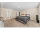 Spacious bedroom with neutral carpet and a queen bed at 4120 Village Nw Blvd, Conover, NC 28613