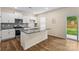 Modern kitchen featuring white cabinets, granite countertops, and stainless steel appliances at 4120 Village Nw Blvd, Conover, NC 28613