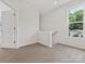 Upstairs hallway with carpet, door, and staircase at 2122 Acclaim St, Charlotte, NC 28205