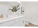 This bathroom boasts double sinks, a stylish mirror, and bright lighting for a spa-like experience at 3655 Mercer St, Terrell, NC 28682
