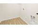 This laundry room is ready for appliances, with a linoleum floor and bright white walls at 3655 Mercer St, Terrell, NC 28682