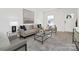 Cozy living room showcasing modern decor, neutral furniture, and a well-lit atmosphere at 3655 Mercer St, Terrell, NC 28682
