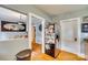 Kitchen area with stainless steel refrigerator and access to dining area at 403 Woodlawn Ave, Gastonia, NC 28052