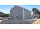 Exterior rear view of a gray two-story home with a spacious backyard and a fenced-in area at 3663 Mercer St, Terrell, NC 28682