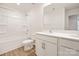 Well-lit bathroom featuring a white vanity with white cabinets, and a tub/shower combo with modern fixtures at 3663 Mercer St, Terrell, NC 28682