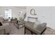 Inviting living room with a staircase, contemporary furnishings, and stylish decor at 3663 Mercer St, Terrell, NC 28682