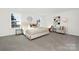 Serene main bedroom with large windows, neutral decor, and plenty of natural light at 3663 Mercer St, Terrell, NC 28682
