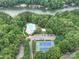 Community pool, tennis courts, and lakefront access at 4409 Solemn Point Ln, Charlotte, NC 28216