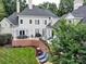 Brick patio with pergola, grill, and ample seating at 4409 Solemn Point Ln, Charlotte, NC 28216