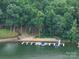 Aerial view of community boat docks on the lake at 4409 Solemn Point Ln, Charlotte, NC 28216