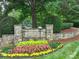 Overlook Swim & Tennis Club entrance with landscaping at 4409 Solemn Point Ln, Charlotte, NC 28216