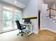 Home office with French doors leading to a deck at 4409 Solemn Point Ln, Charlotte, NC 28216