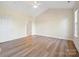 Large bedroom with vaulted ceilings and hardwood floors at 9031 Rosalyn Glen Rd, Cornelius, NC 28031